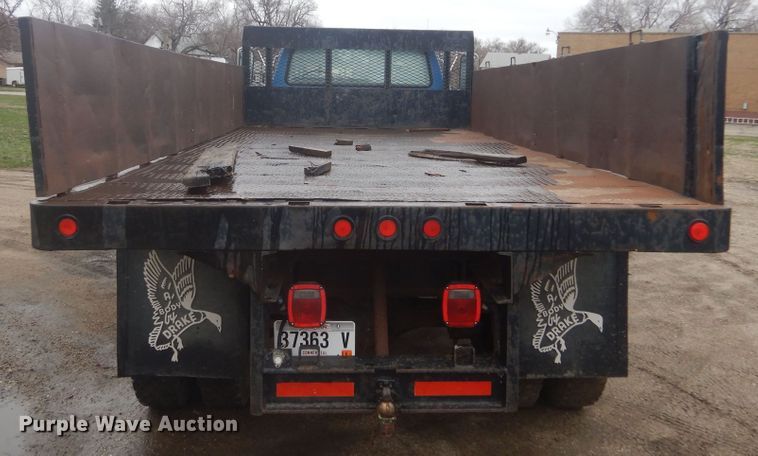 image for item KT9009 1996 Ford F700  dump flatbed truck