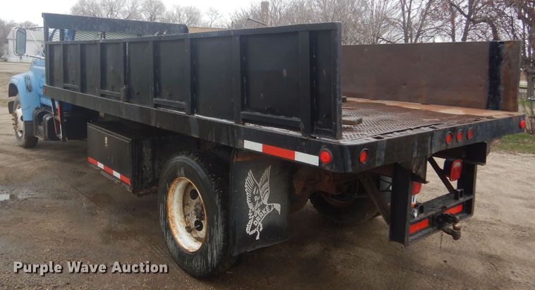 image for item KT9009 1996 Ford F700  dump flatbed truck