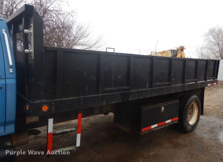 image for item KT9009 1996 Ford F700  dump flatbed truck