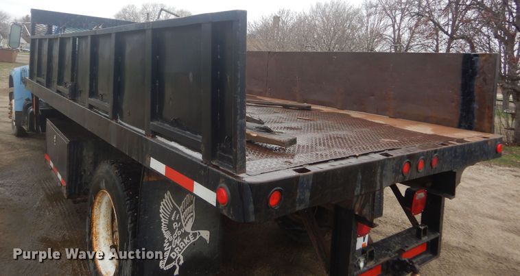image for item KT9009 1996 Ford F700  dump flatbed truck