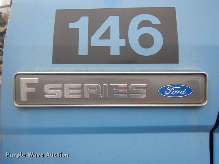 image for item KT9009 1996 Ford F700  dump flatbed truck