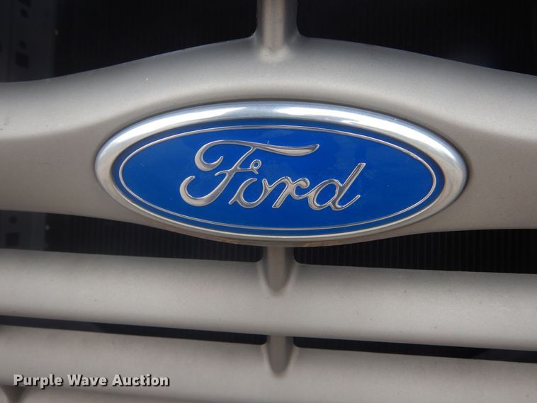 image for item KT9009 1996 Ford F700  dump flatbed truck