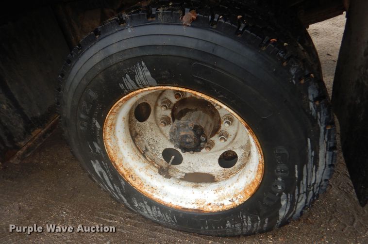 image for item KT9009 1996 Ford F700  dump flatbed truck