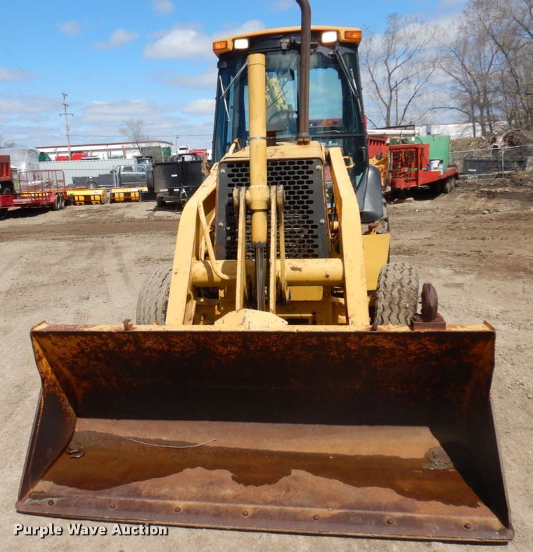 image for item MF9565 John Deere 310E  backhoe