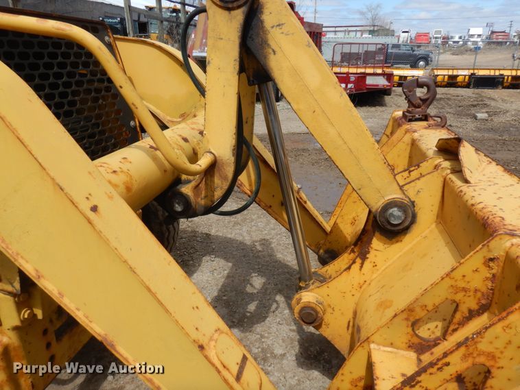 image for item MF9565 John Deere 310E  backhoe