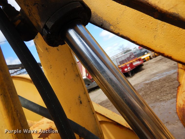 image for item MF9565 John Deere 310E  backhoe