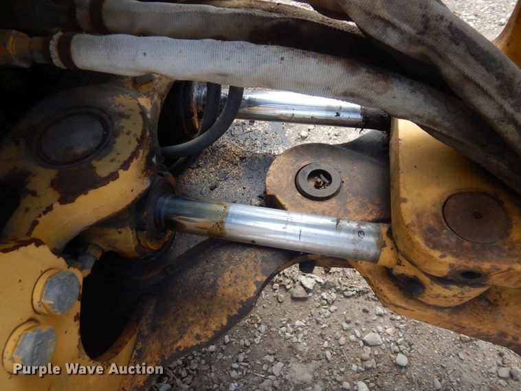 image for item MF9565 John Deere 310E  backhoe