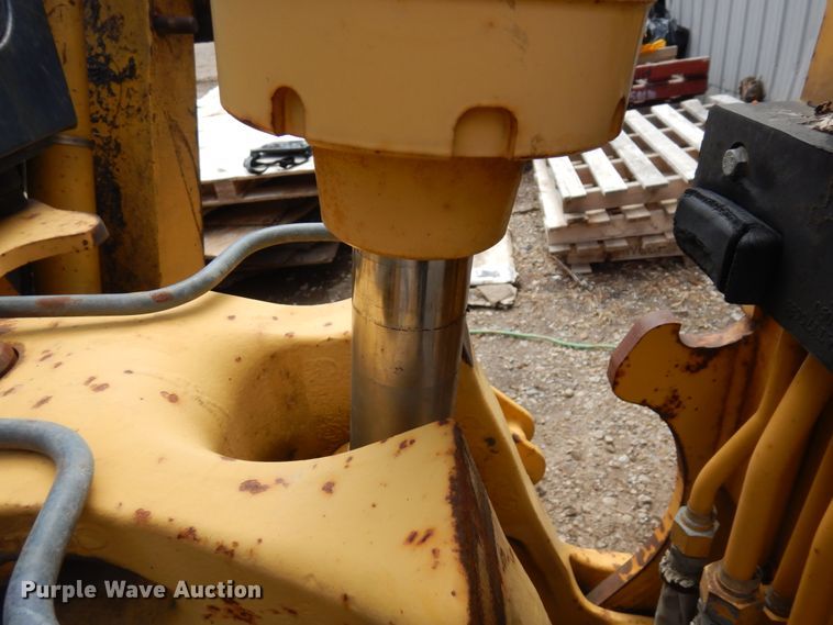 image for item MF9565 John Deere 310E  backhoe