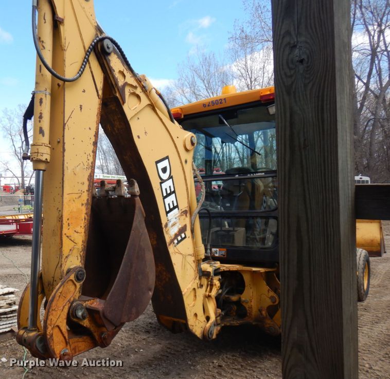 image for item MF9565 John Deere 310E  backhoe