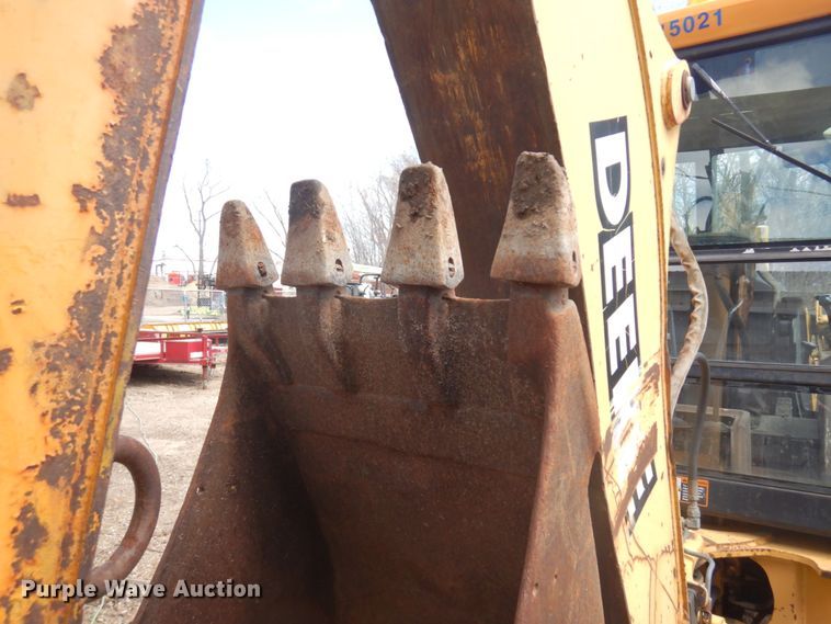 image for item MF9565 John Deere 310E  backhoe