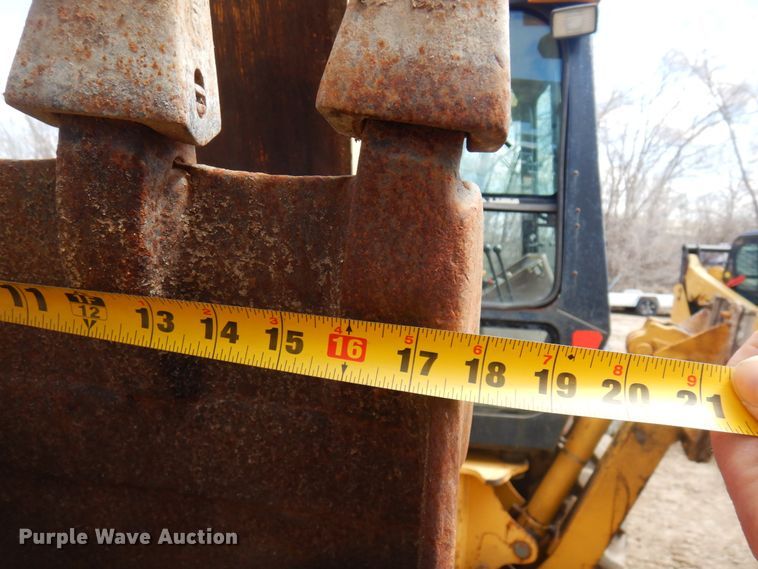 image for item MF9565 John Deere 310E  backhoe