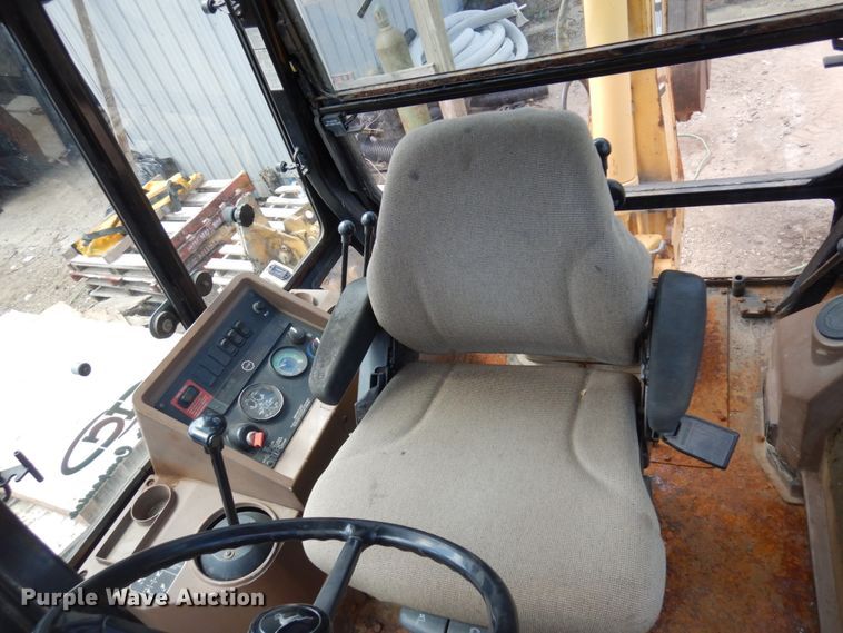 image for item MF9565 John Deere 310E  backhoe