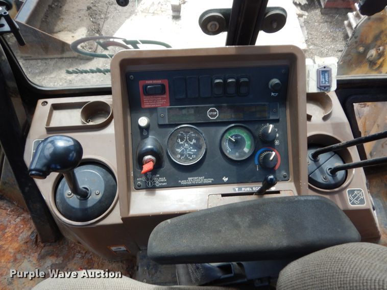 image for item MF9565 John Deere 310E  backhoe