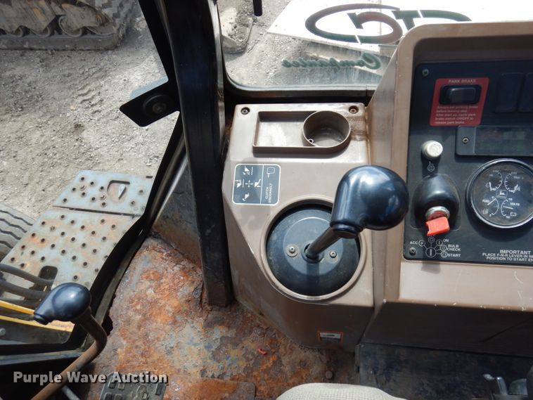 image for item MF9565 John Deere 310E  backhoe