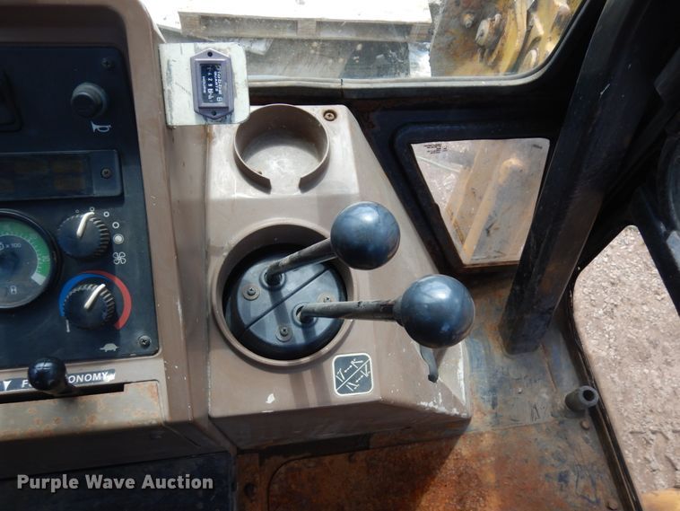 image for item MF9565 John Deere 310E  backhoe