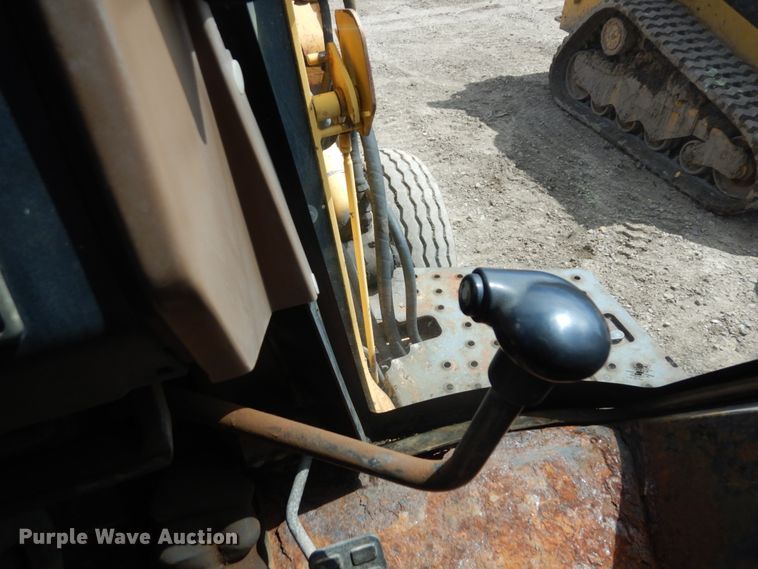 image for item MF9565 John Deere 310E  backhoe