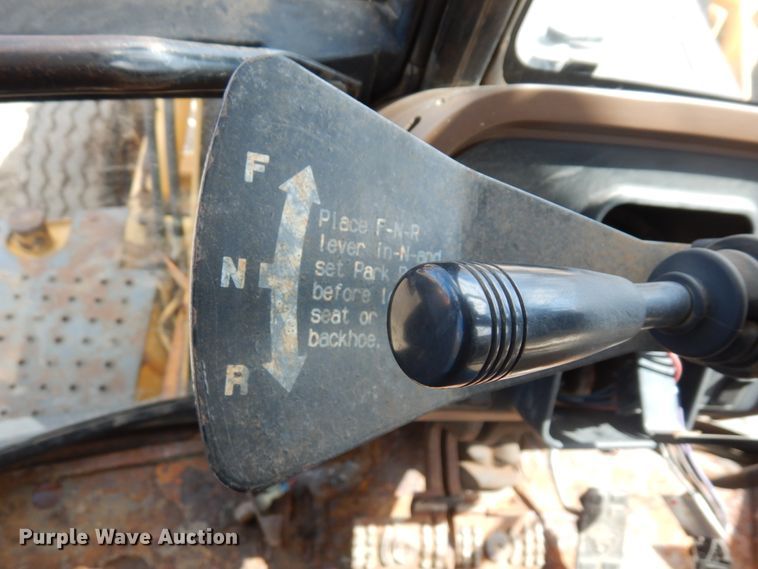 image for item MF9565 John Deere 310E  backhoe