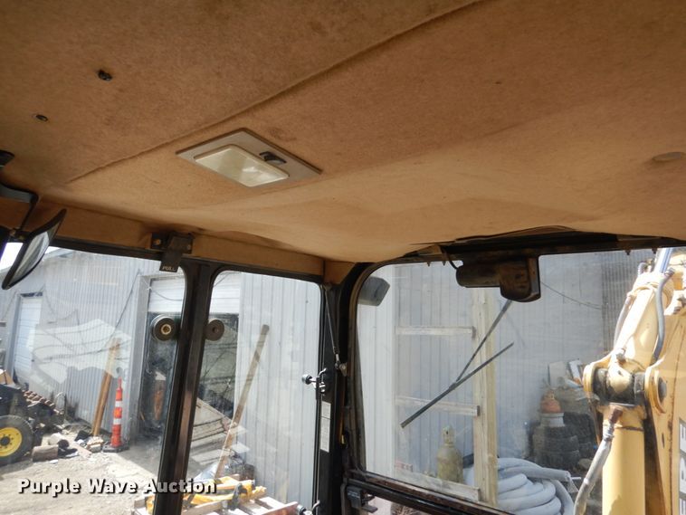 image for item MF9565 John Deere 310E  backhoe