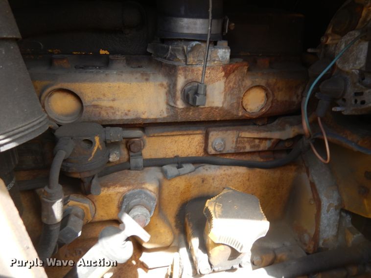 image for item MF9565 John Deere 310E  backhoe