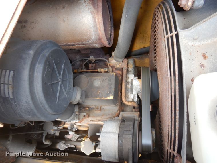 image for item MF9565 John Deere 310E  backhoe