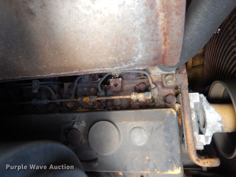 image for item MF9565 John Deere 310E  backhoe