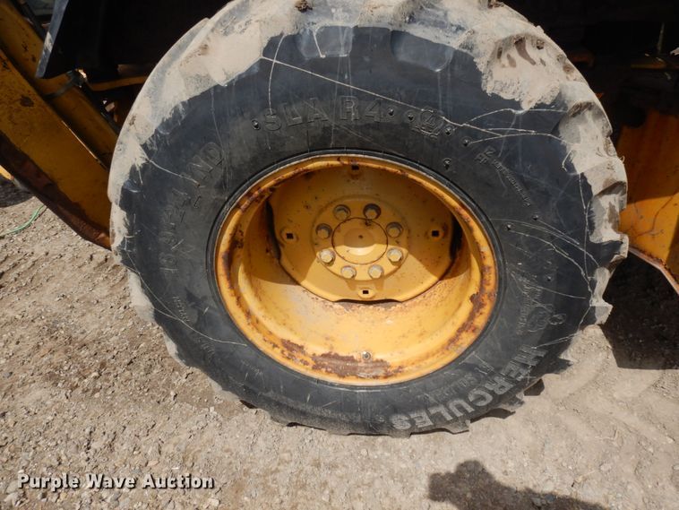 image for item MF9565 John Deere 310E  backhoe