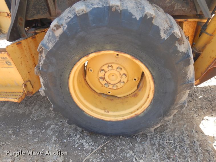 image for item MF9565 John Deere 310E  backhoe