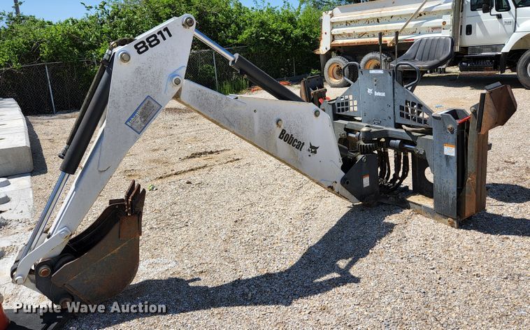 image for item KE9703 Bobcat 8811 skid steer backhoe attachment