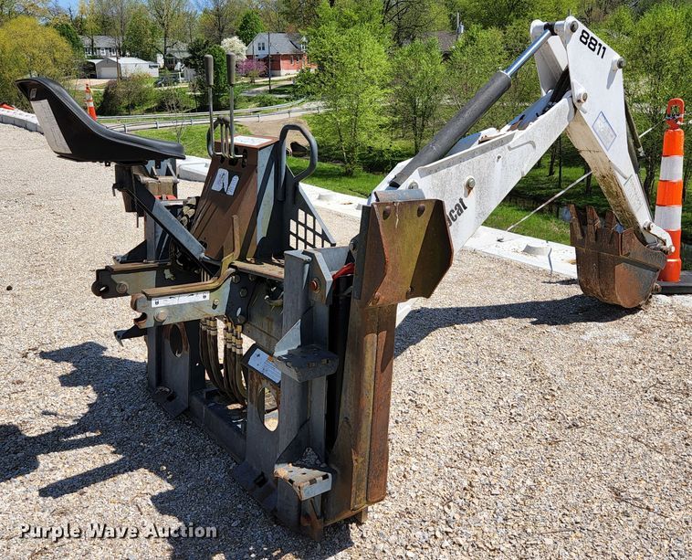 image for item KE9703 Bobcat 8811 skid steer backhoe attachment