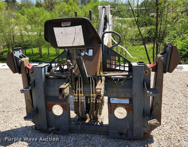 image for item KE9703 Bobcat 8811 skid steer backhoe attachment