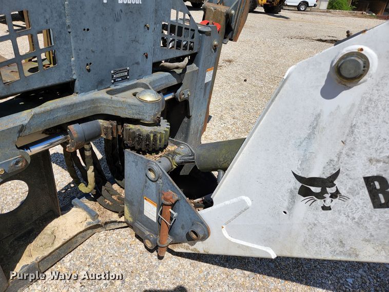 image for item KE9703 Bobcat 8811 skid steer backhoe attachment