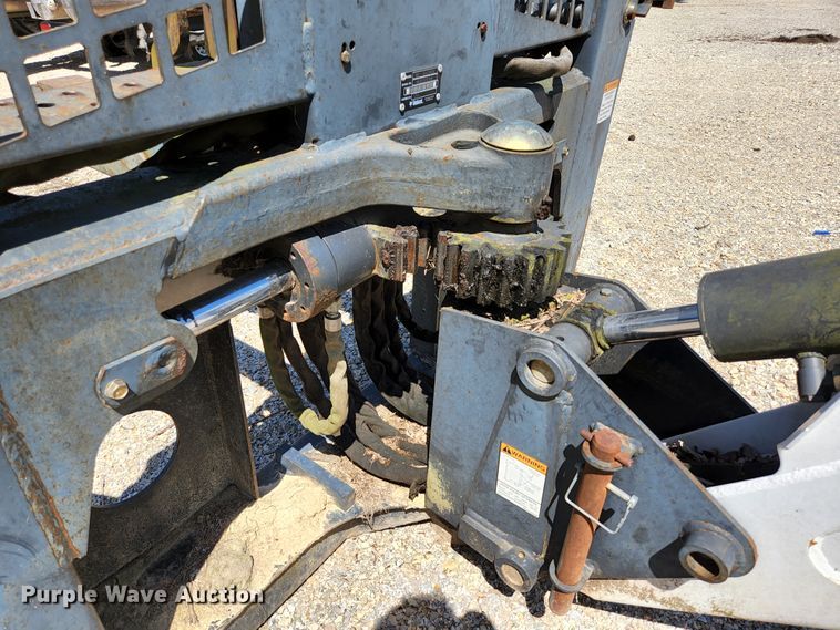 image for item KE9703 Bobcat 8811 skid steer backhoe attachment