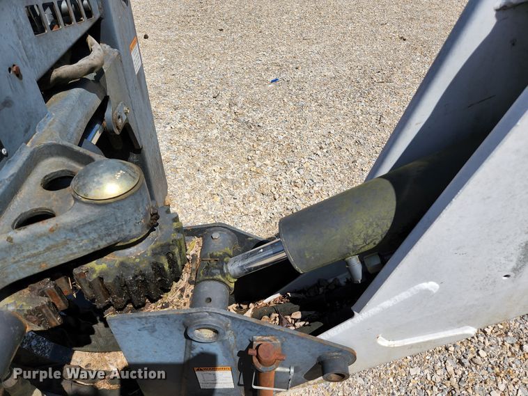 image for item KE9703 Bobcat 8811 skid steer backhoe attachment