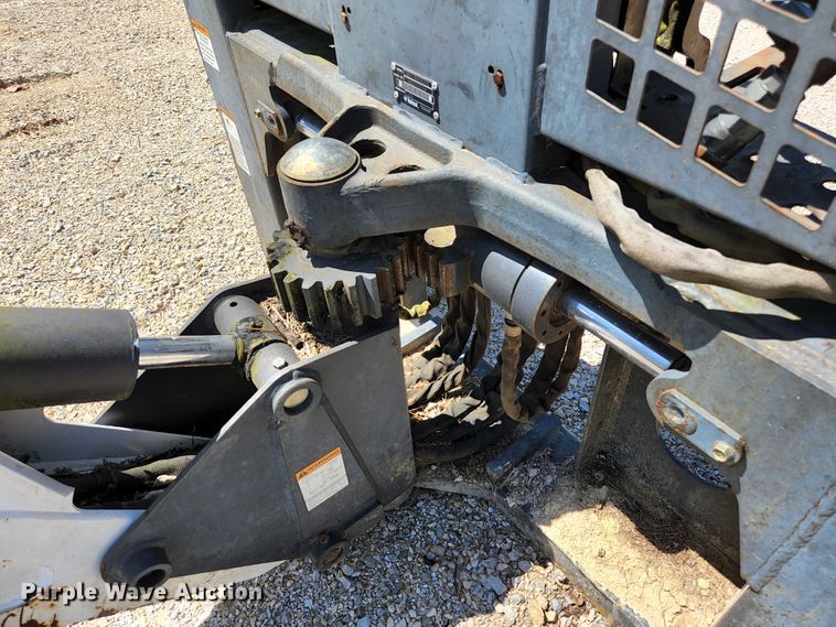 image for item KE9703 Bobcat 8811 skid steer backhoe attachment