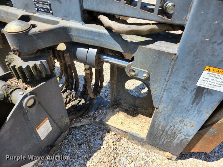 image for item KE9703 Bobcat 8811 skid steer backhoe attachment