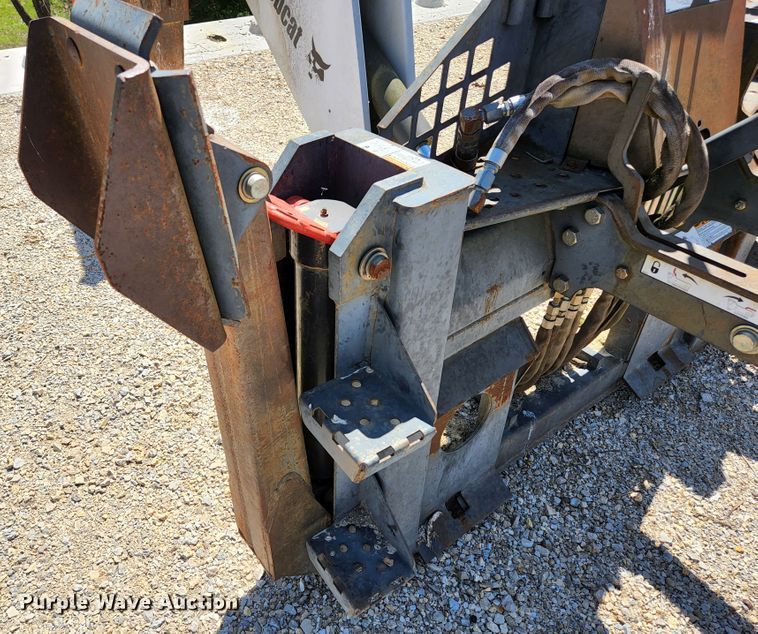 image for item KE9703 Bobcat 8811 skid steer backhoe attachment