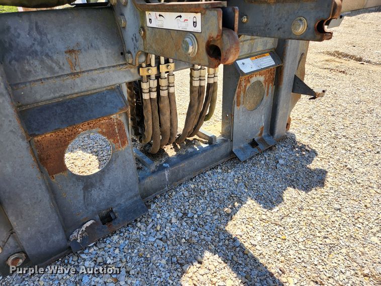 image for item KE9703 Bobcat 8811 skid steer backhoe attachment