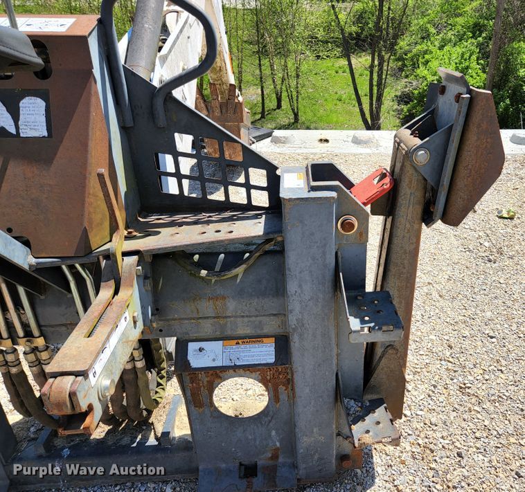 image for item KE9703 Bobcat 8811 skid steer backhoe attachment