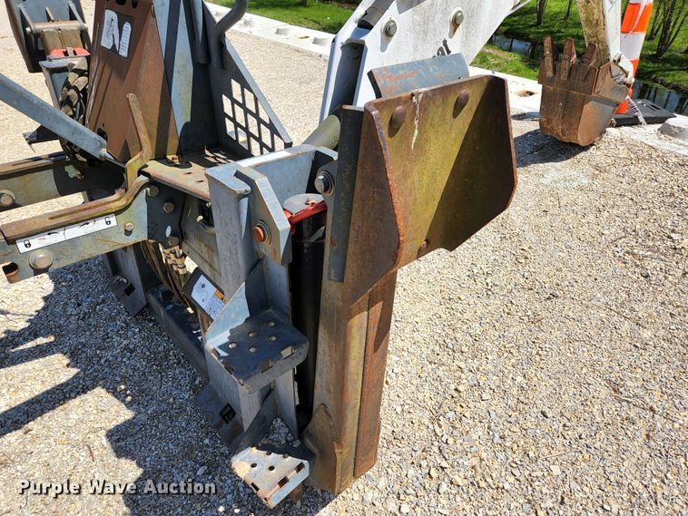 image for item KE9703 Bobcat 8811 skid steer backhoe attachment