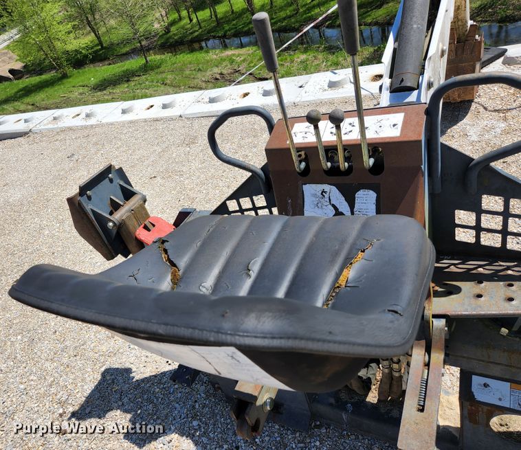 image for item KE9703 Bobcat 8811 skid steer backhoe attachment