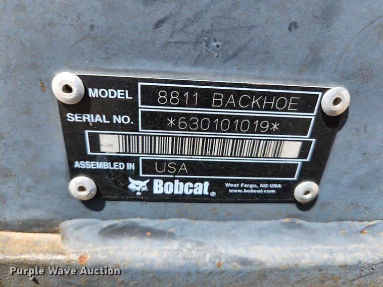 image for item KE9703 Bobcat 8811 skid steer backhoe attachment