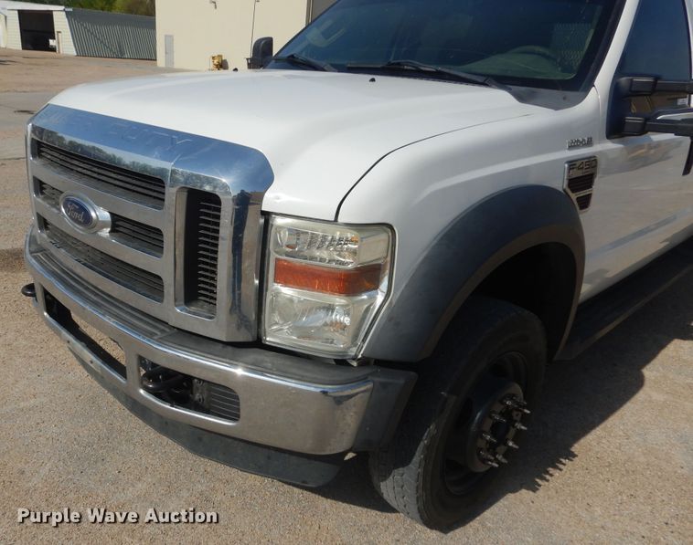 image for item KS9961 2009 Ford F450 Super Duty XLT  Crew Cab flatbed truck