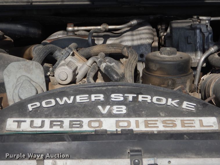 image for item KS9961 2009 Ford F450 Super Duty XLT  Crew Cab flatbed truck