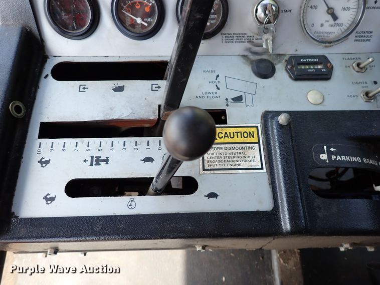 image for item DN6812 Case IH 8830  windrower