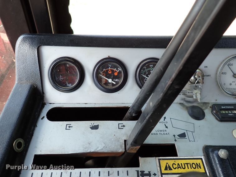 image for item DN6812 Case IH 8830  windrower