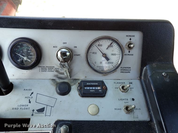 image for item DN6812 Case IH 8830  windrower