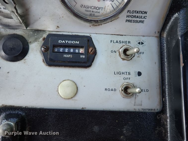 image for item DN6812 Case IH 8830  windrower