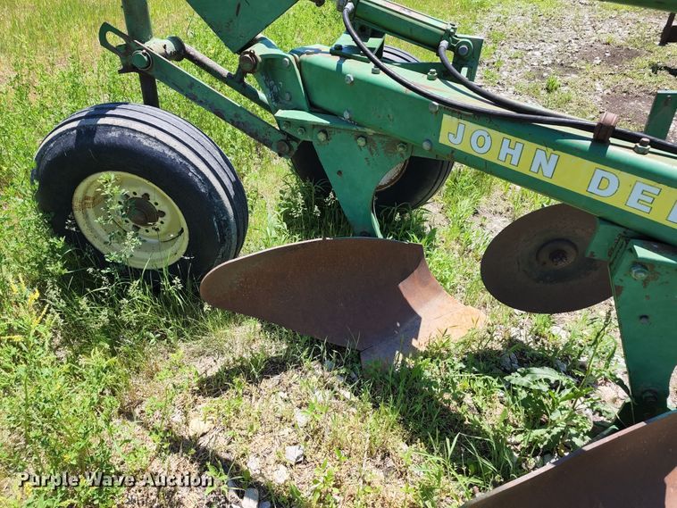 image for item KF9012 John Deere  eight bottom plow