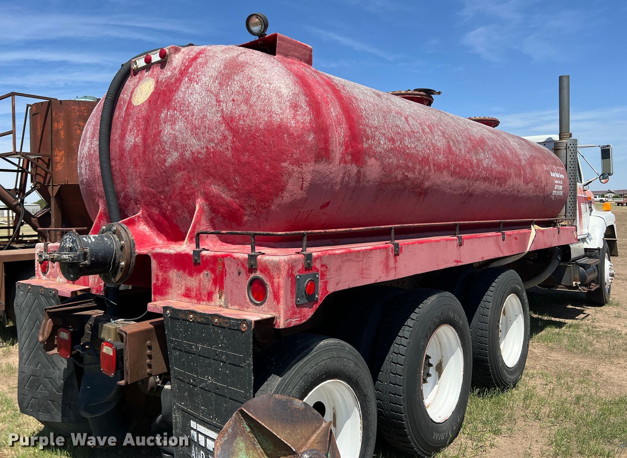 Fiberglass tank bed in Sublette, KS Item DR1411 sold Purple Wave