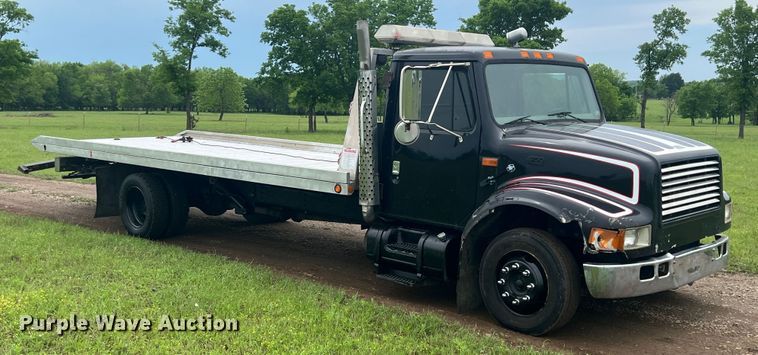 image for item HL9025 1997 International 4700  rollback truck